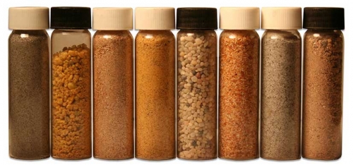 small vials of rocks and dirt
