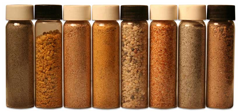 small vials of rocks and dirt